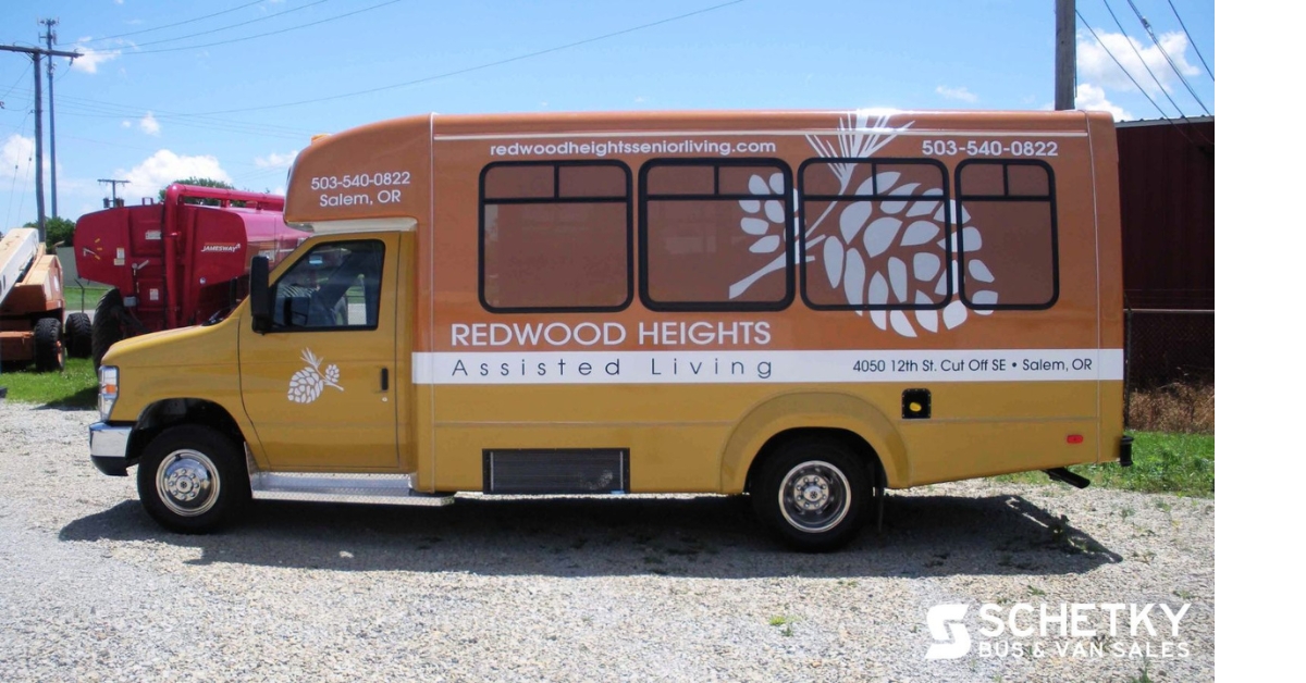 orange senior living shuttle bus with wheelchair lift